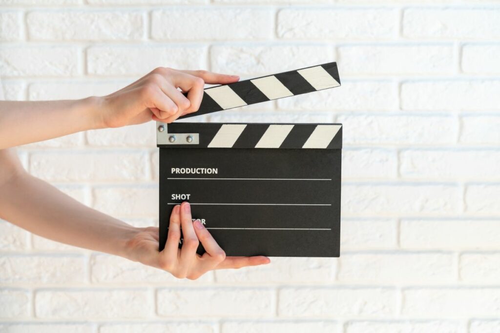 girl using movie clapper image